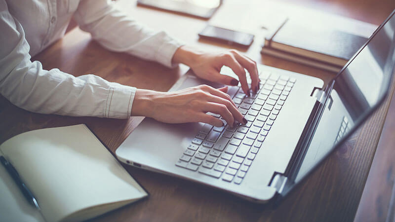 a woman editing a book