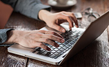 an author optimizing book metadata on a laptop