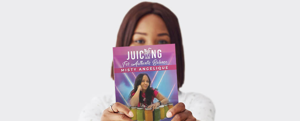 a woman holding a non-fiction book published by BookBaby