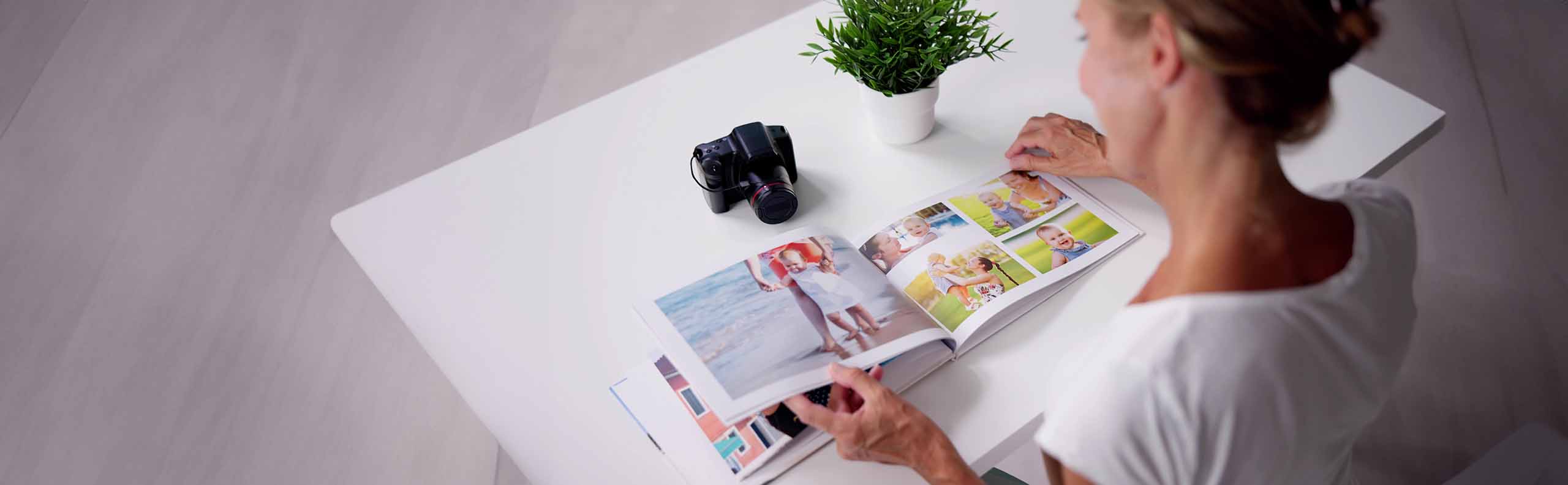 woman flipping through a custom photography book